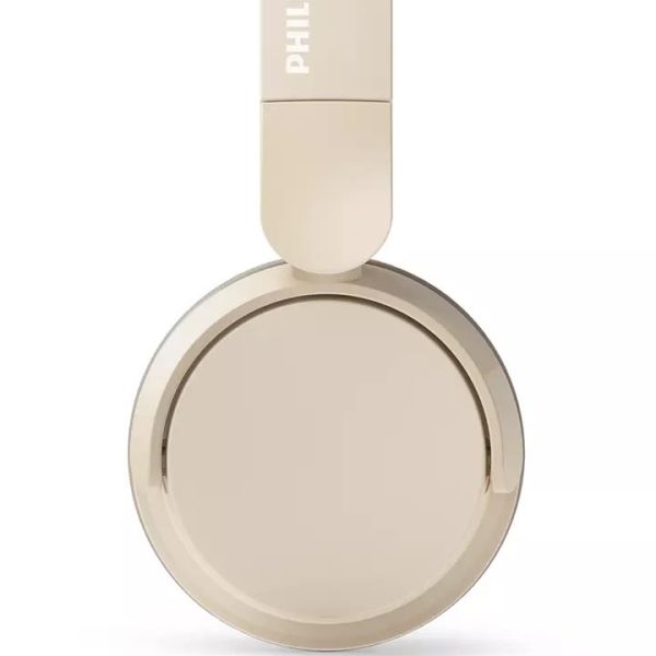 Philips TAH3209BG/00 bež Bluetooth slušalice sklopljene na stolu
