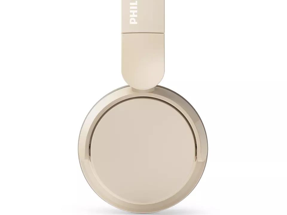 Philips TAH3209BG/00 bež Bluetooth slušalice sklopljene na stolu